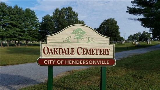 Photo of sign reading: "Oakdale Cemetery, City of Hendersonville"