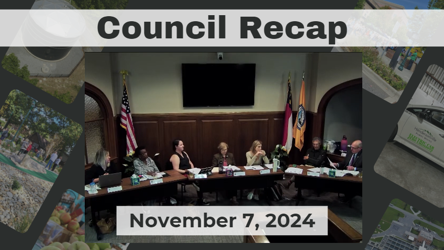 City council members sit together during a council meeting at Dias. 