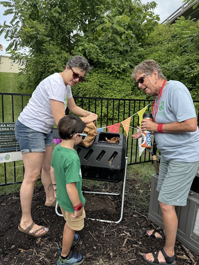 Participant learn how to compost at station