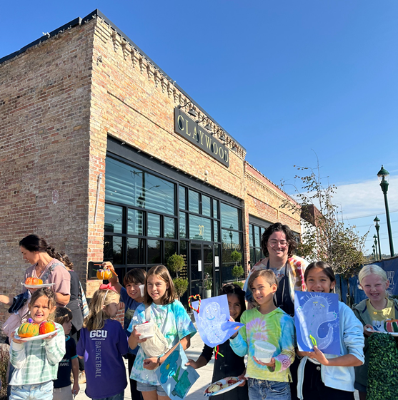 Children outside of Claywood after storm